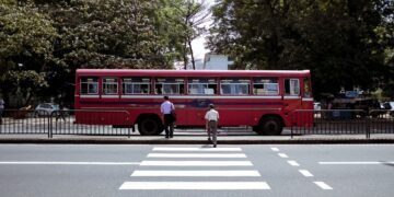 local bus passing through a zebra crossing