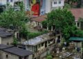 sri lankan houses near buddha statue