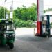 tuktuk stopped at Sri lankan filling station