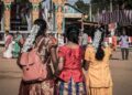 Women in vibrant traditional attire at a festive gathering in Jaffna, Sri Lanka
