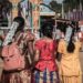 Women in vibrant traditional attire at a festive gathering in Jaffna, Sri Lanka